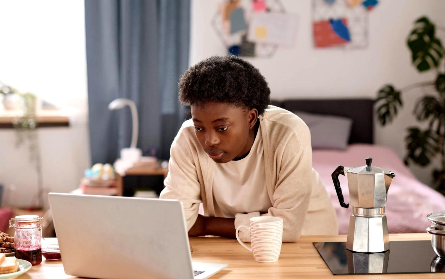 Family engaging in remote financial learning session