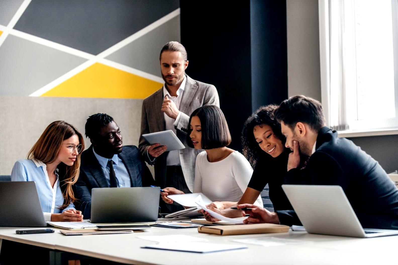 Investment planning session with financial documents and growth charts